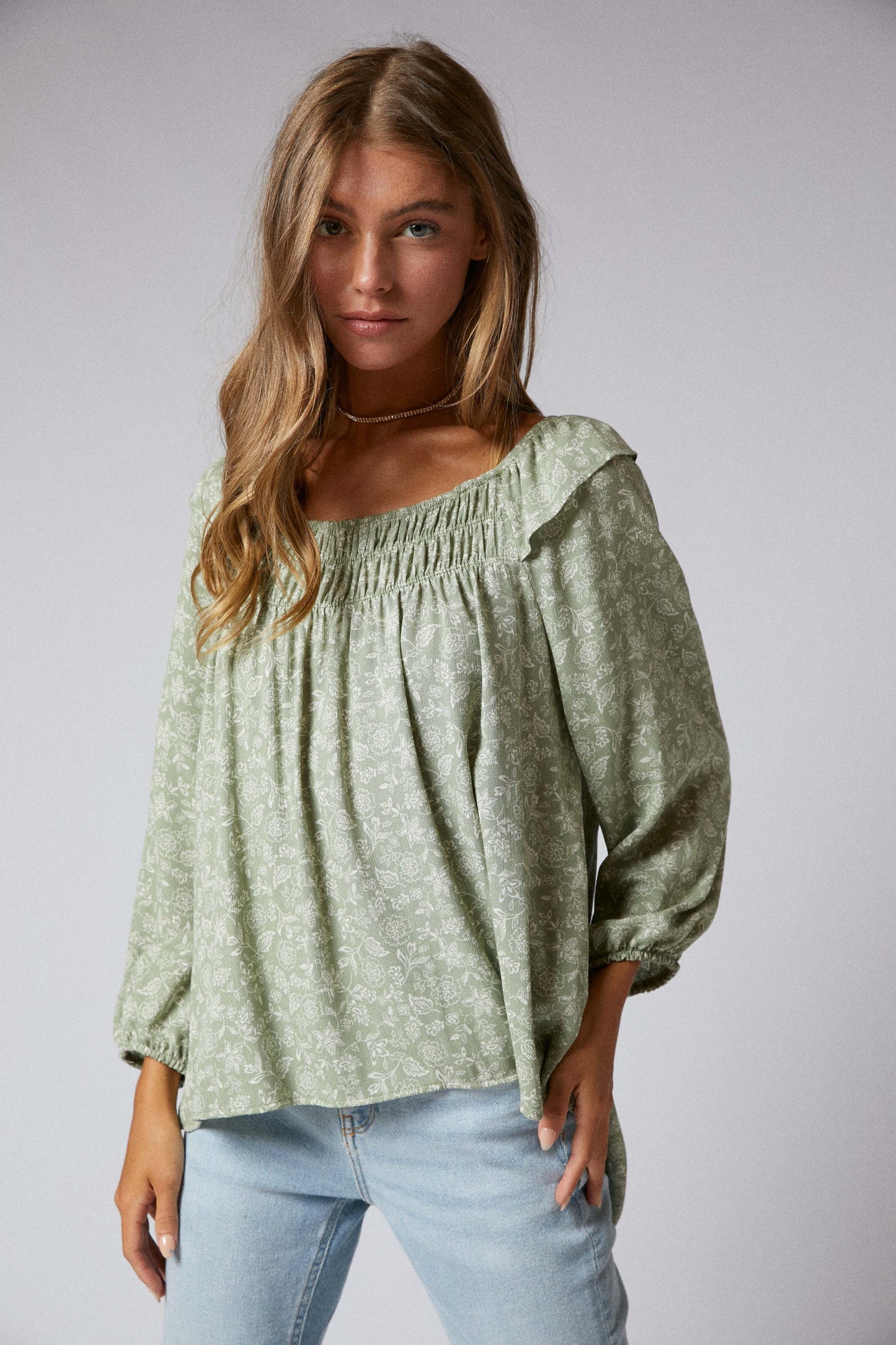 C090-T1159 - 3/4 Sleeves Ruffle Peasant Hi Low Top
